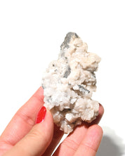 Calcite Crystal Cluster Canada 67g - in hand showing rhombohedral crystals