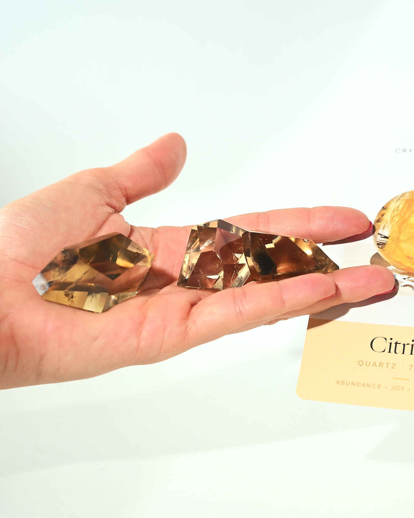 Citrine Geometric Diamond in hand