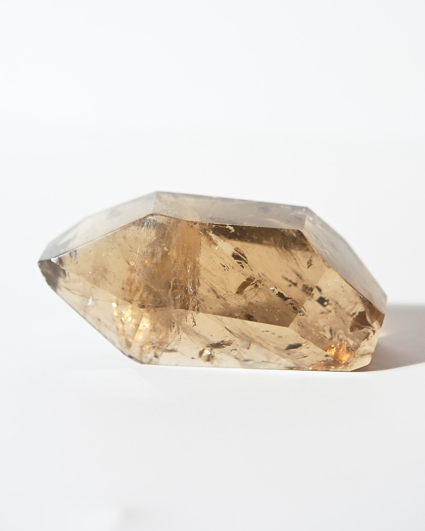 Natural smoky citrine point side view