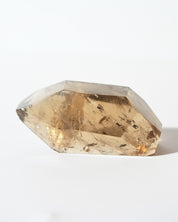 Natural smoky citrine point side view
