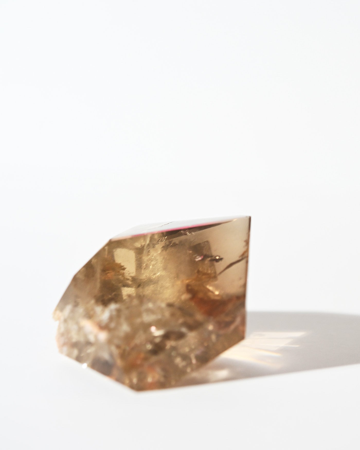 Smoky Citrine Geometric Free Form 132g on oak surface