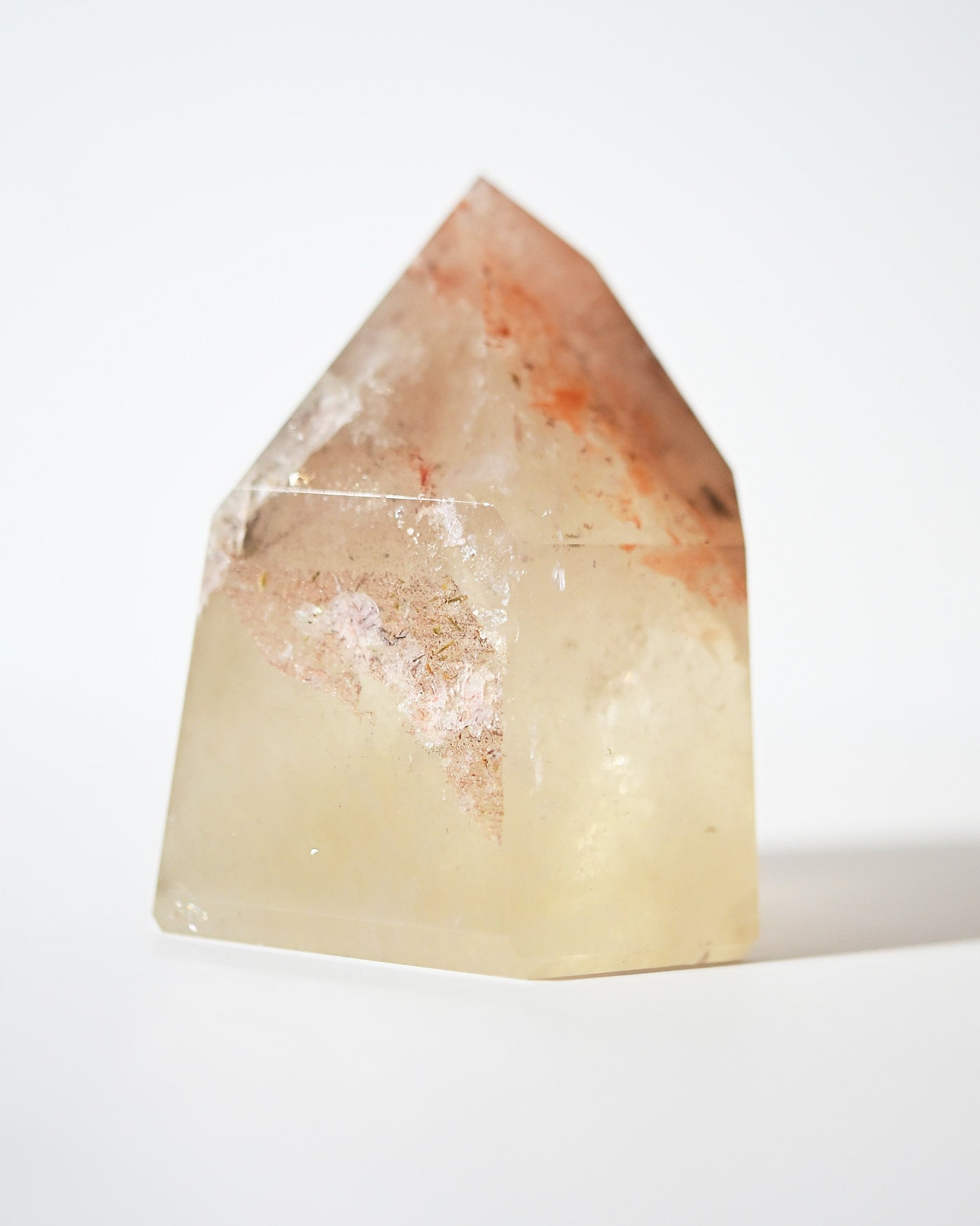 Natural citrine tower showing clear golden base and included tip