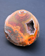 Fighting Blood Agate Geode with Dendrites 0.58 lb - top view