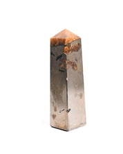 Golden Healer Quartz Tower with Pyrite held in hand