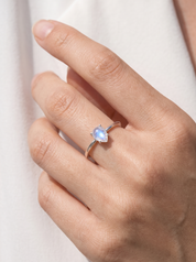 Rainbow Moonstone Teardrop Ring in Sterling Silver worn on hand - Crystals.com