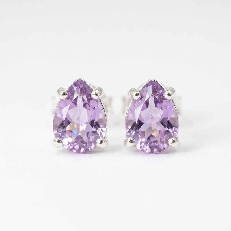 Sterling Silver Tear Drop Genuine Amethyst Stud Earrings close-up macro shot