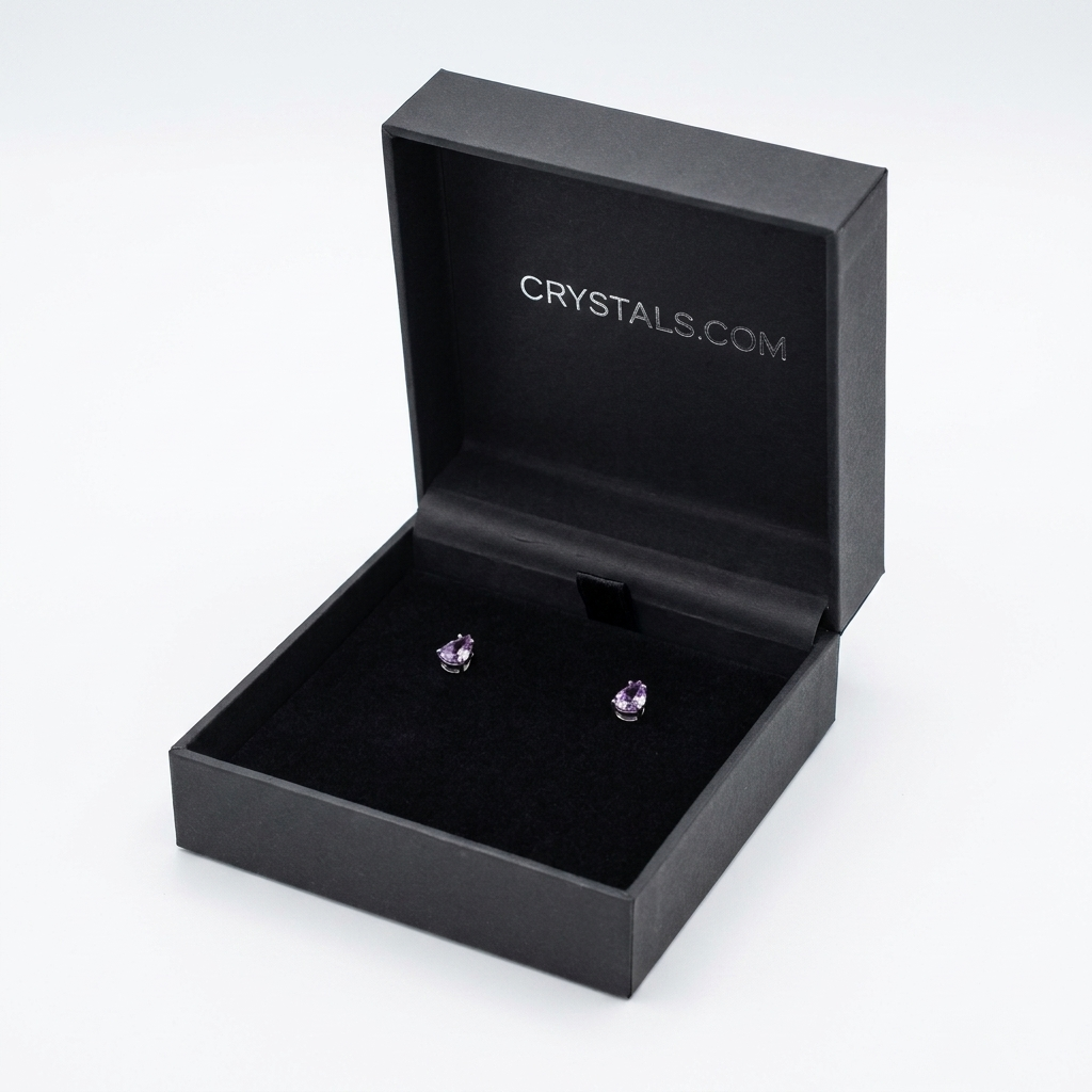 Amethyst teardrop stud earrings in CRYSTALS.COM jewelry box - top view