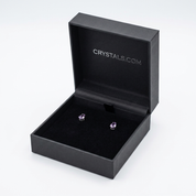 Amethyst teardrop stud earrings in CRYSTALS.COM jewelry box - top view