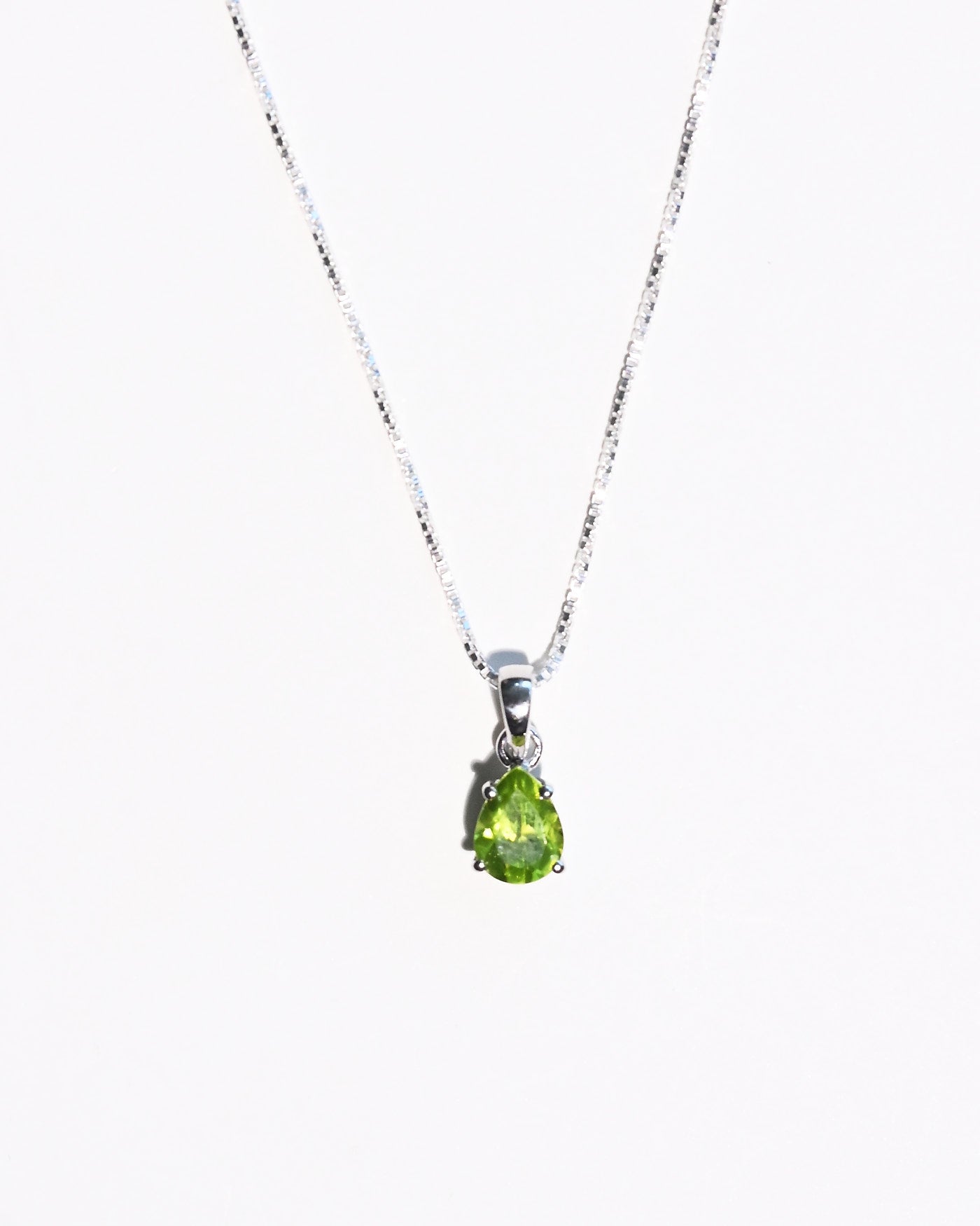 Peridot pear pendant on sterling silver box chain