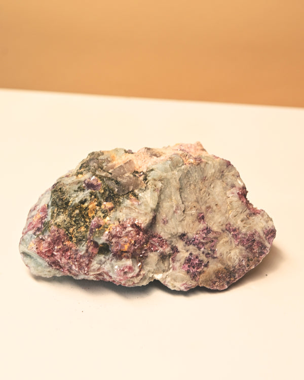 Mineral sample on a beige background