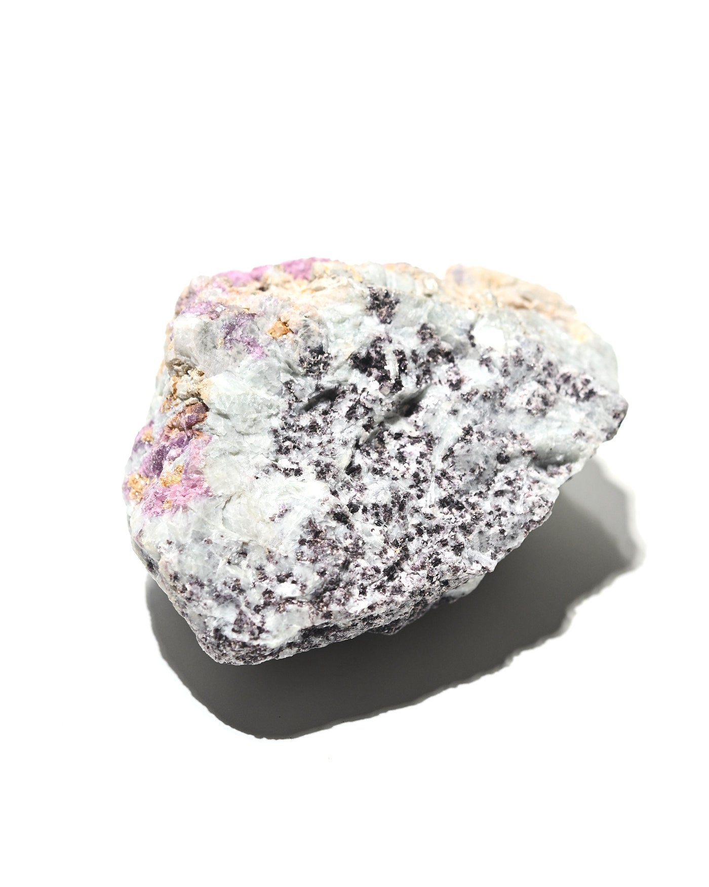 Natural lepidolite specimen showing pink-purple mica