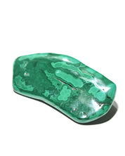Malachite freeform with flowing green banding and botryoidal texture