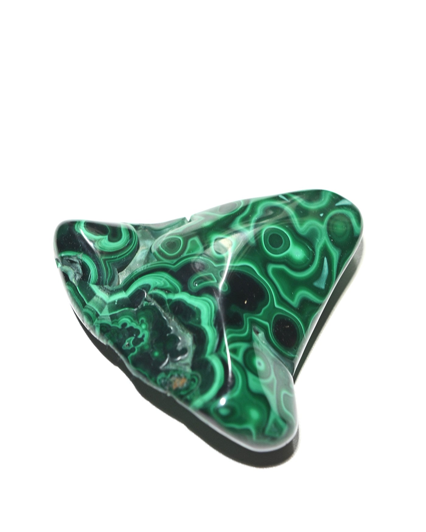 Malachite freeform side view showing concentric rings