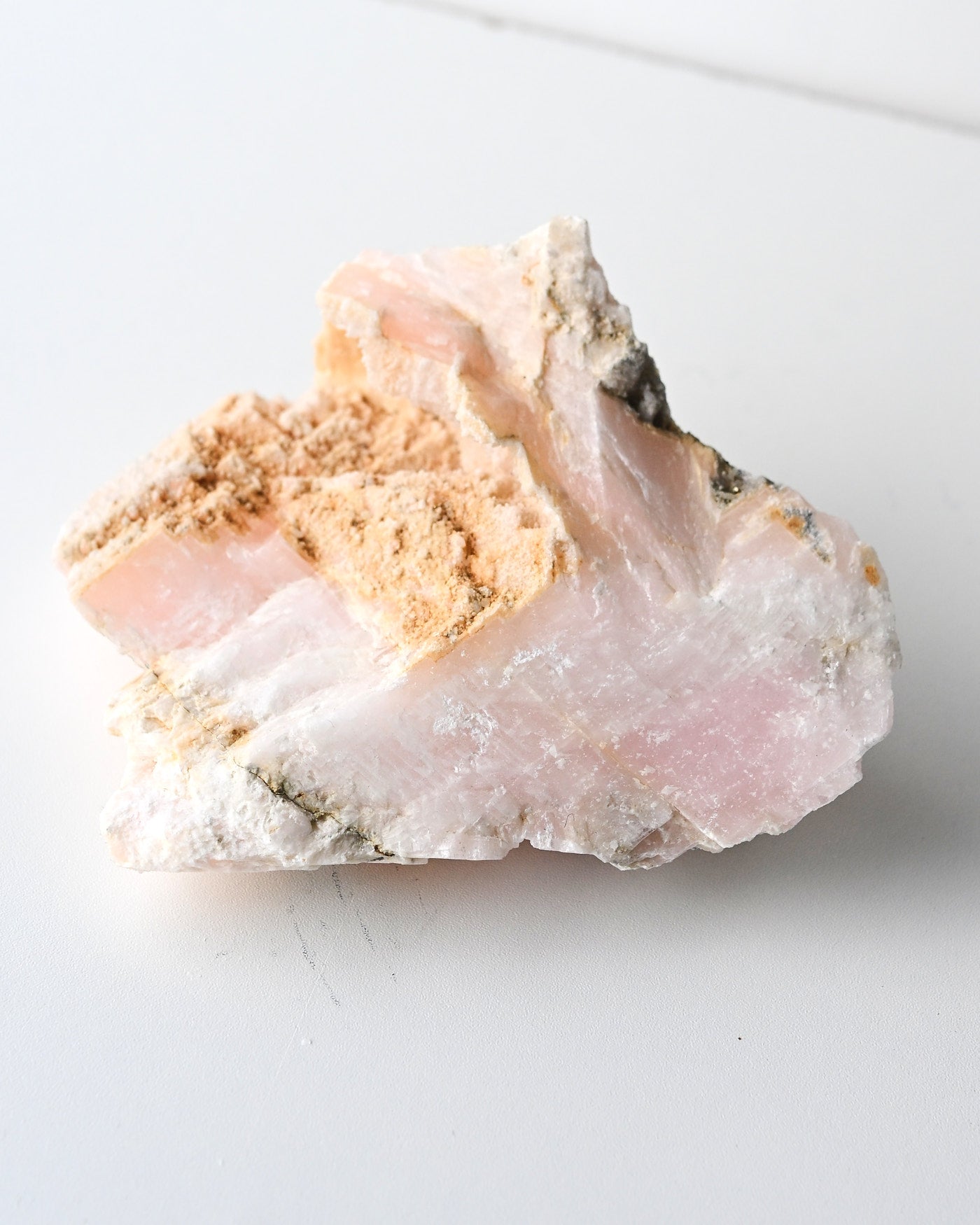Manganoan calcite with pyrite side view