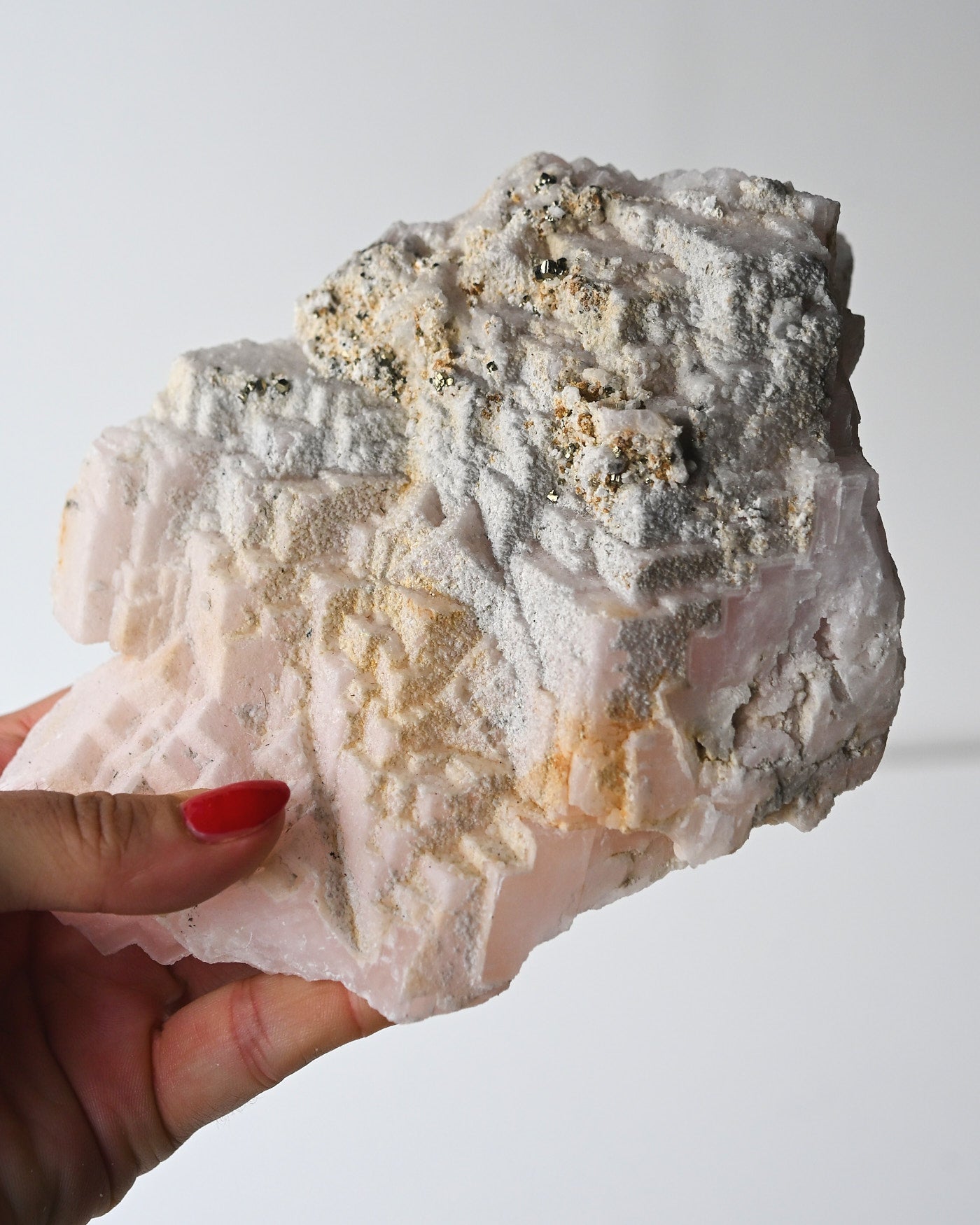 Manganoan calcite with pyrite back view
