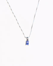 Emerald-cut tanzanite pendant detail