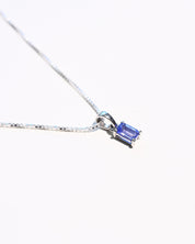Emerald-cut tanzanite necklace close-up