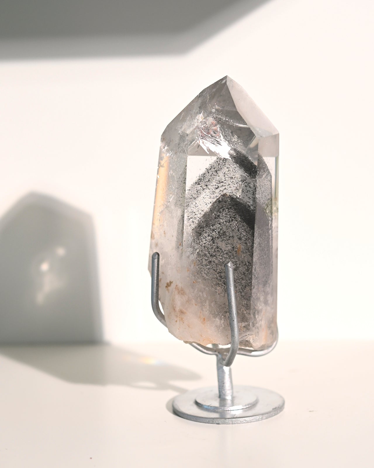 Lemurian Seed Crystal with Gray Phantom on Stand