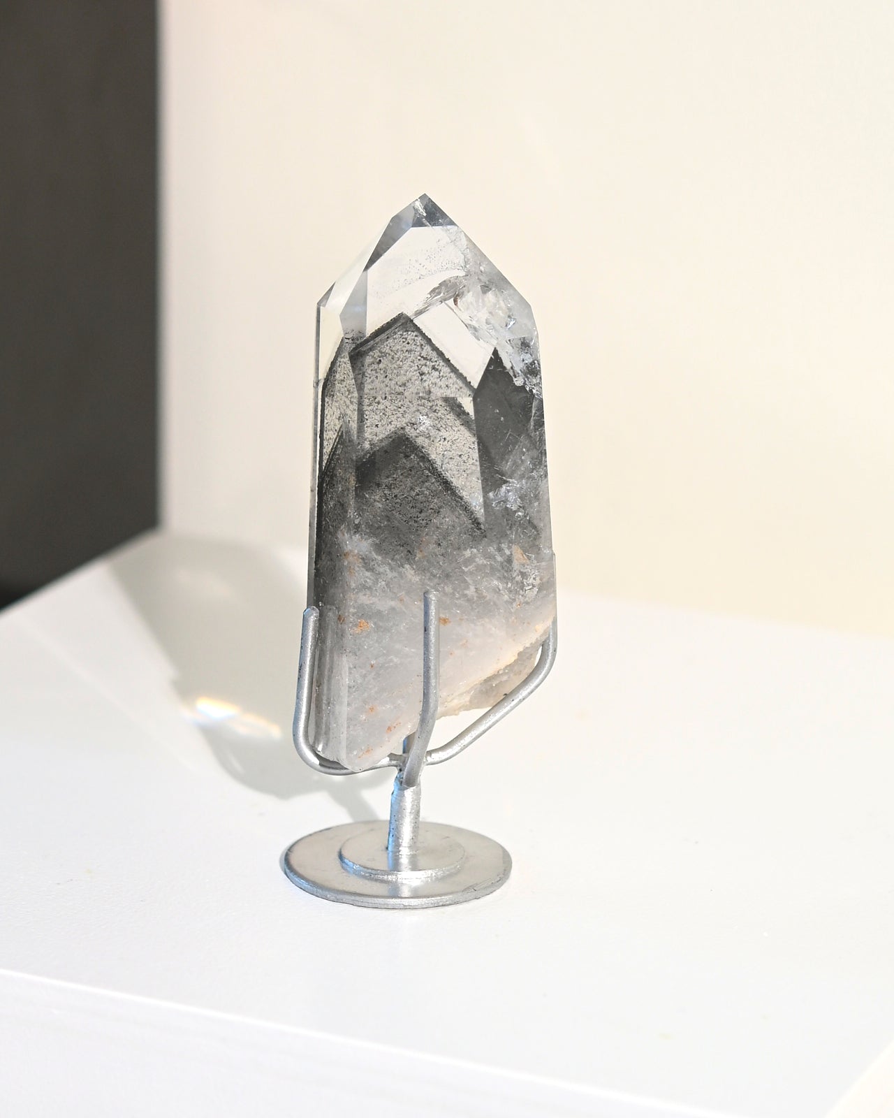 Lemurian Seed Crystal with Gray Phantom on Stand