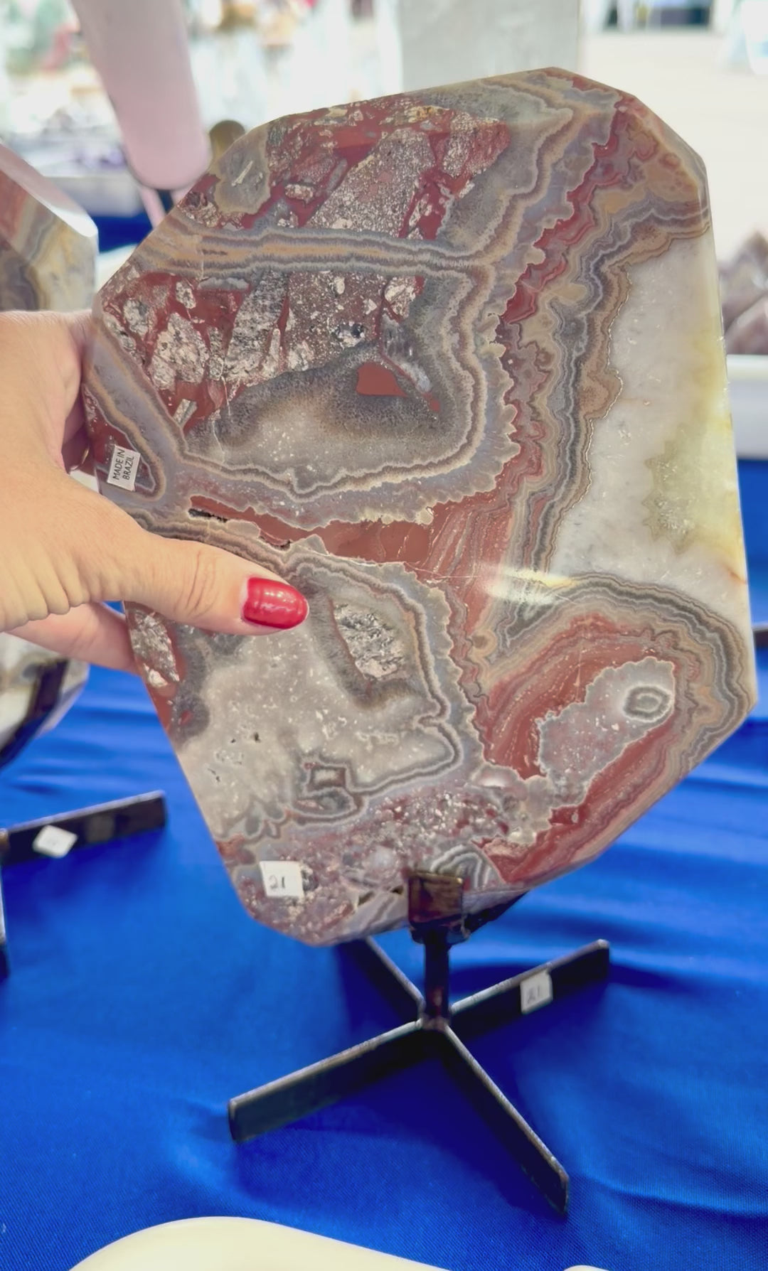Red banded Agate slab on stand Brazil