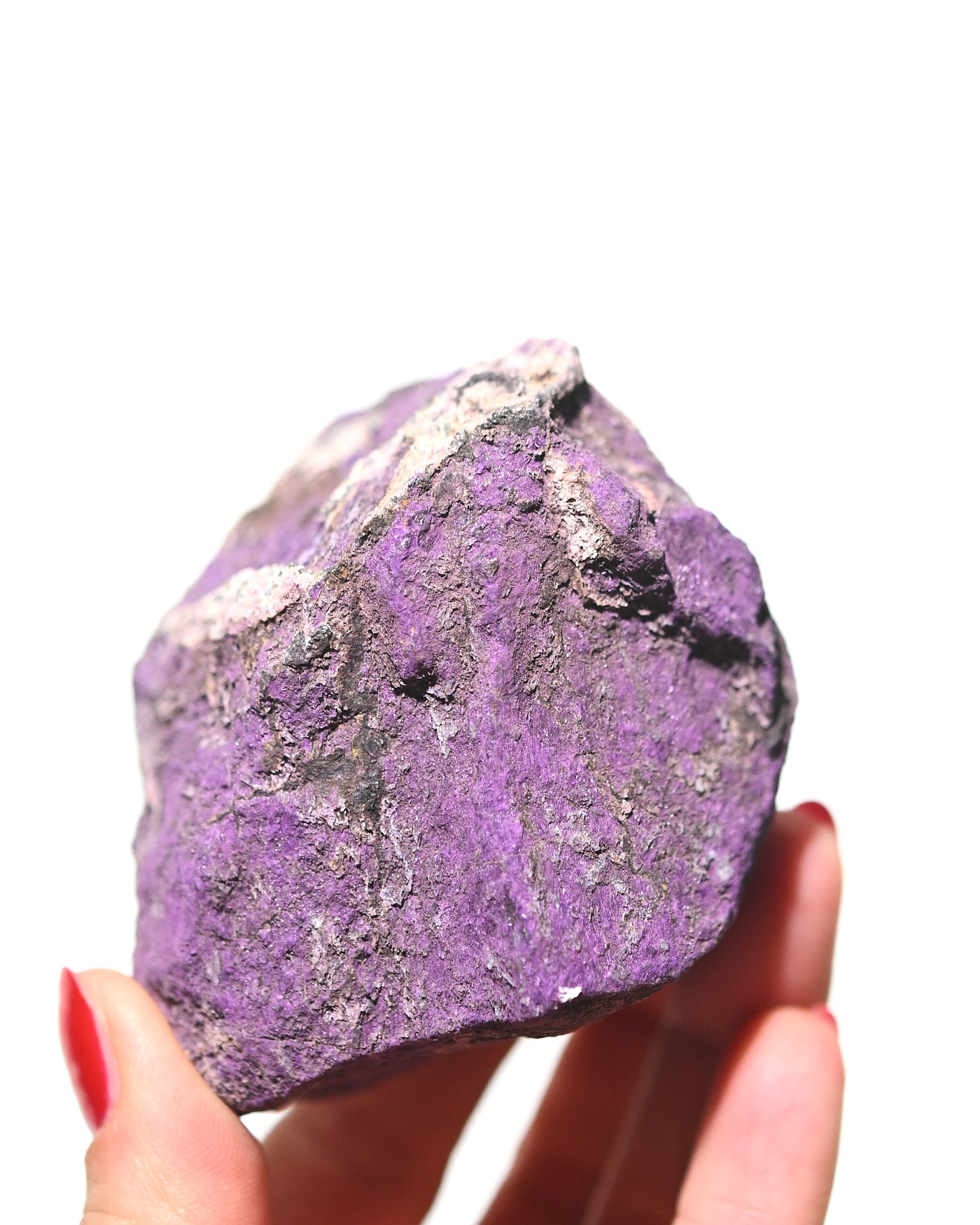Purpurite raw mineral specimen side view