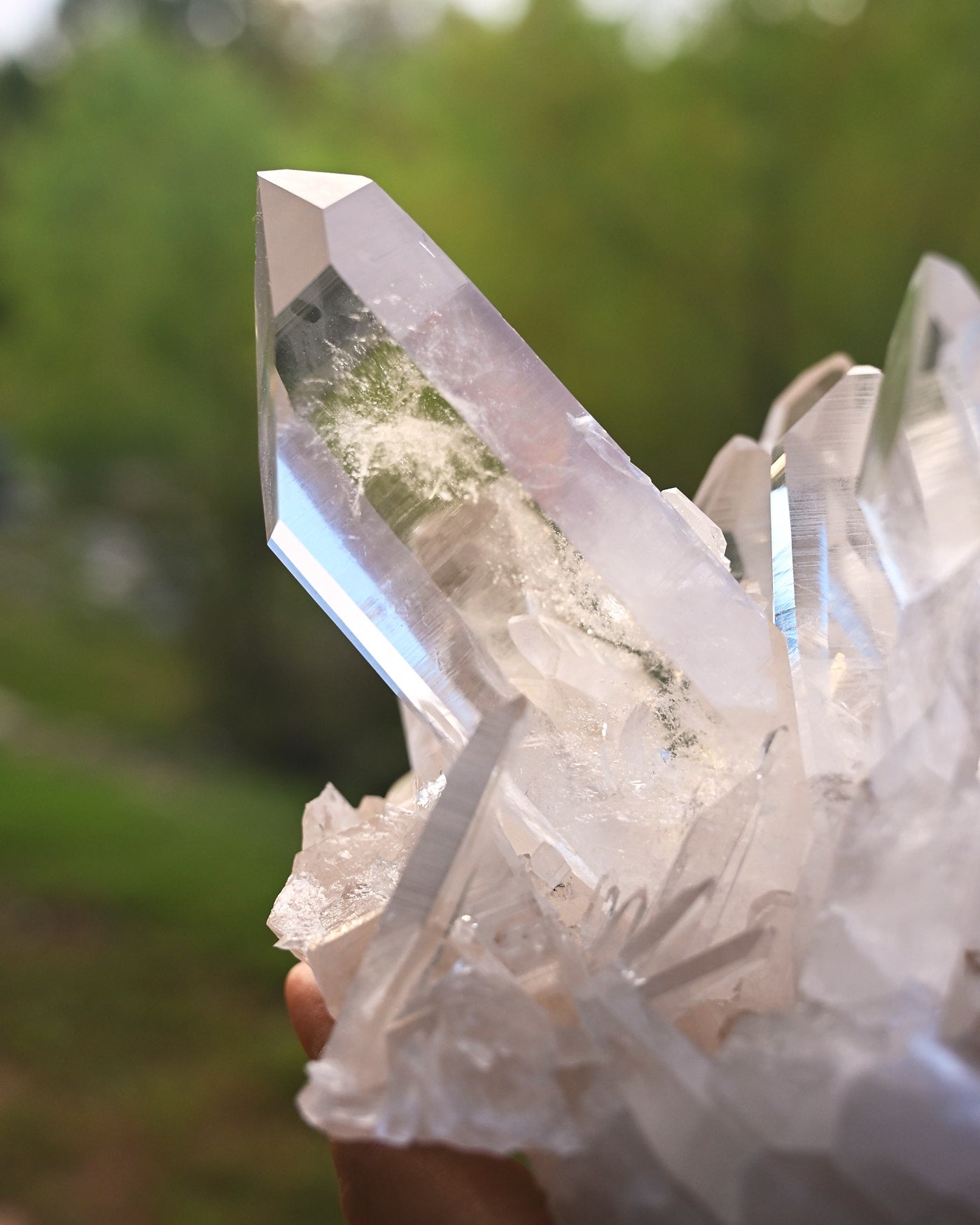 Arkansas Clear Quartz Cluster 2.995 lb - in hand showing clarity