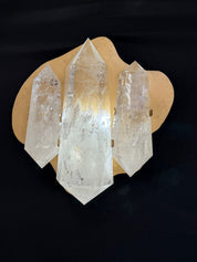 Three double terminated quartz sconces about 14 x 16" ready to mount 