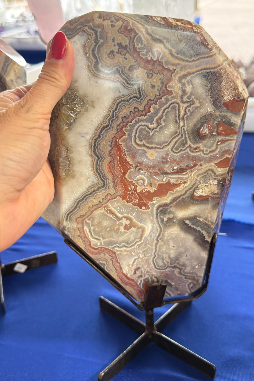 Red banded Agate slab on stand Brazil