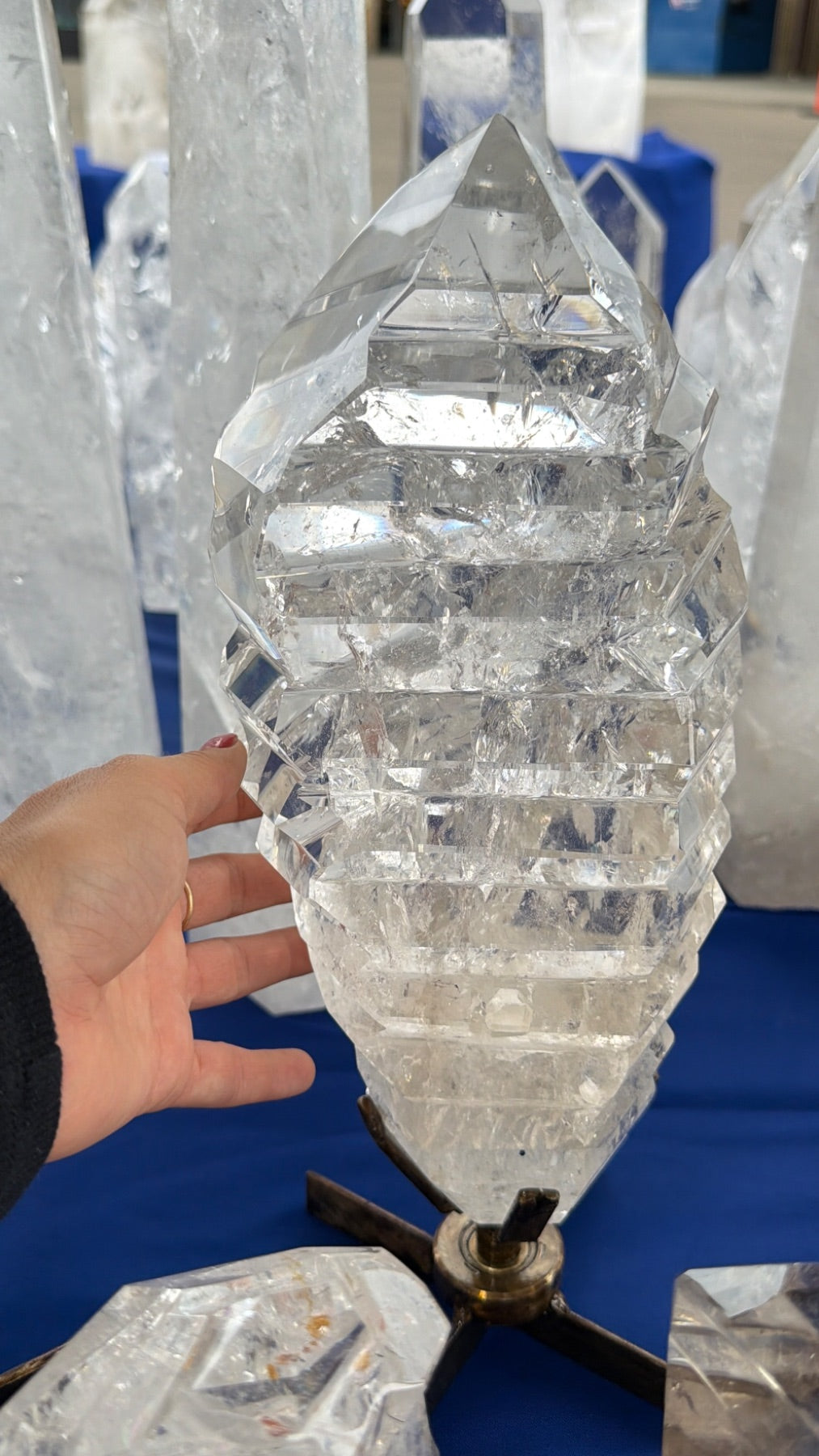 Statement clear Quartz wavy a treat form on stand