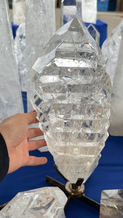 Statement clear Quartz wavy a treat form on stand