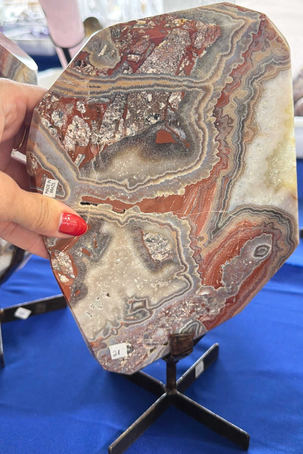 Red banded Agate slab on stand Brazil