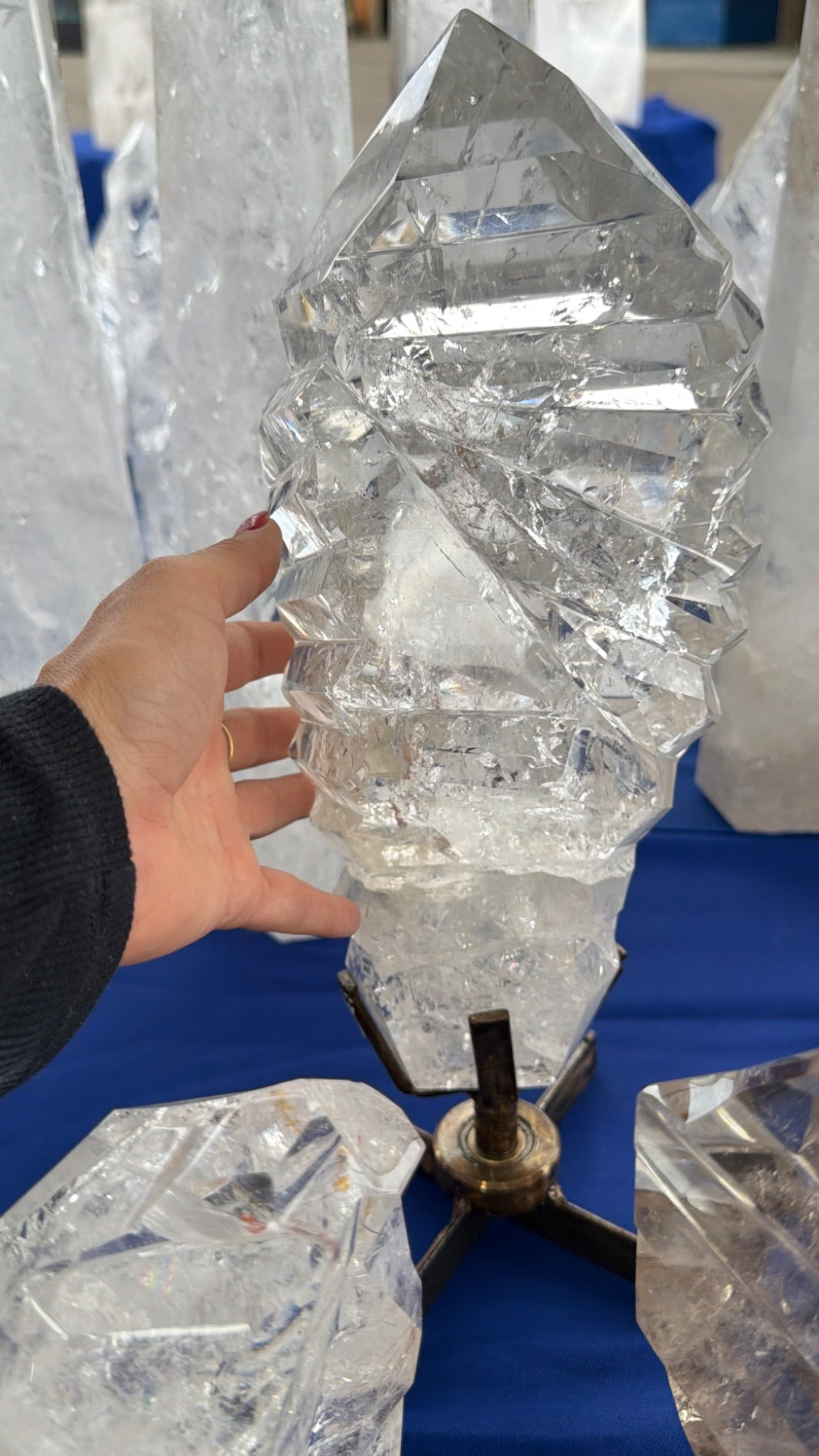 Statement clear Quartz wavy a treat form on stand