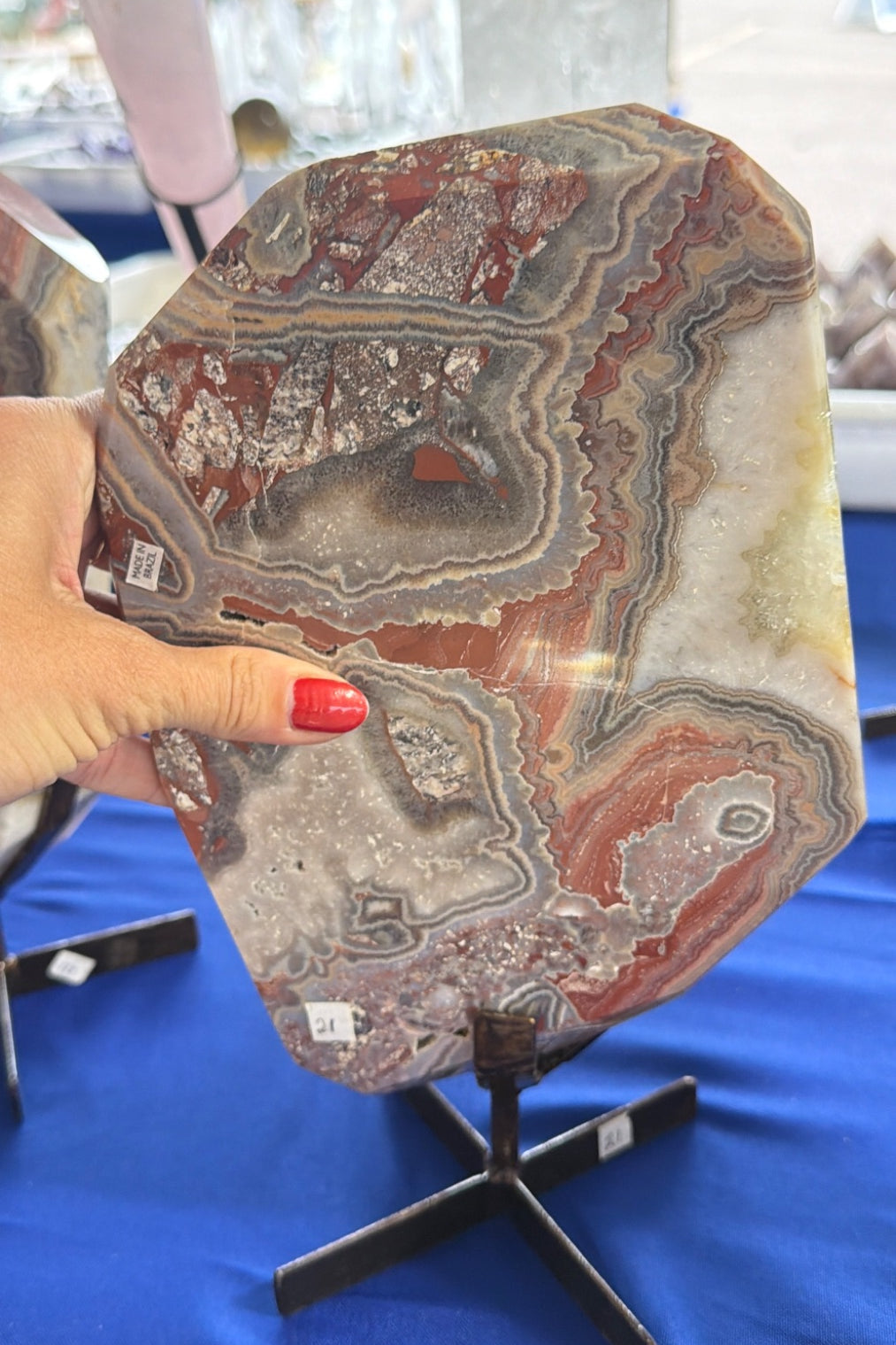 Red banded Agate slab on stand Brazil