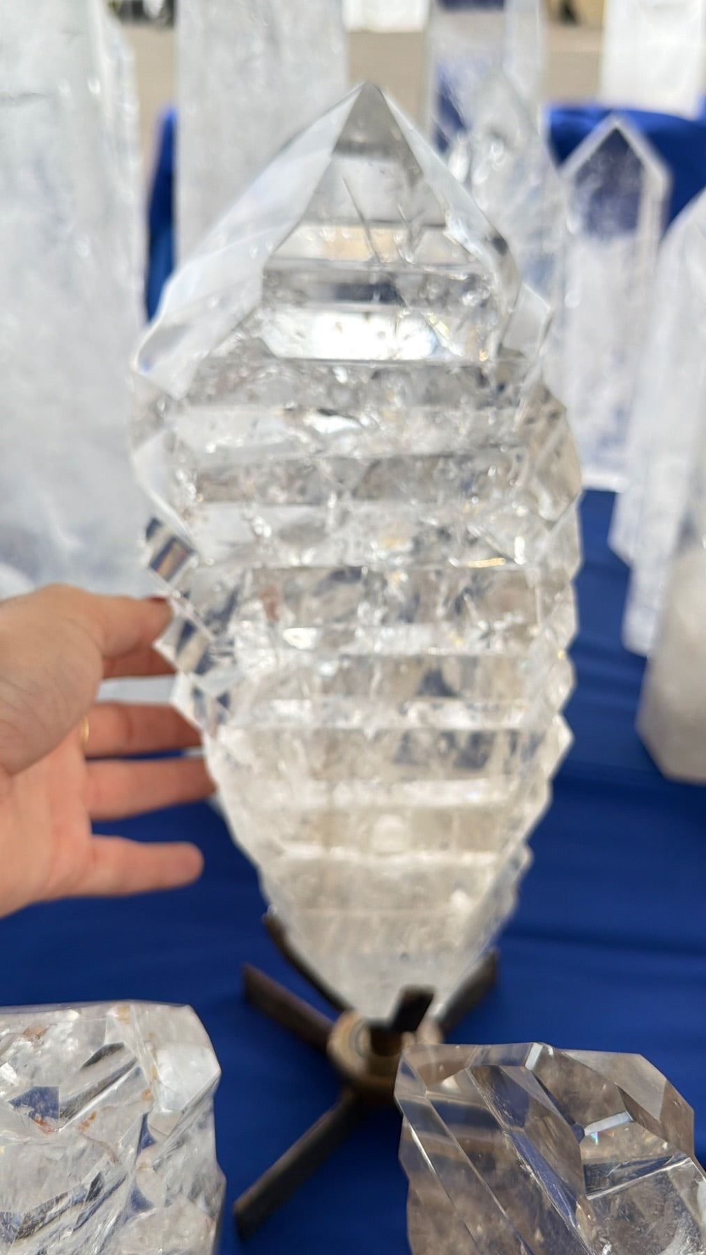 Statement clear Quartz wavy a treat form on stand