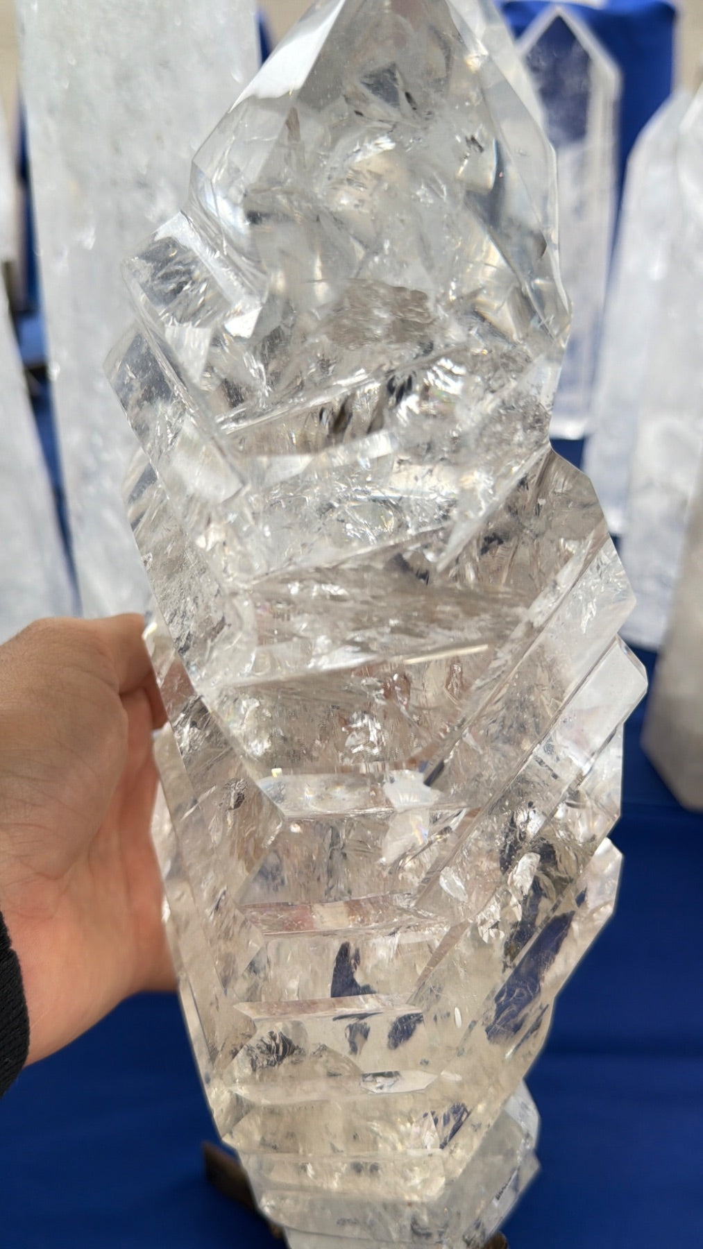 Statement clear Quartz wavy a treat form on stand