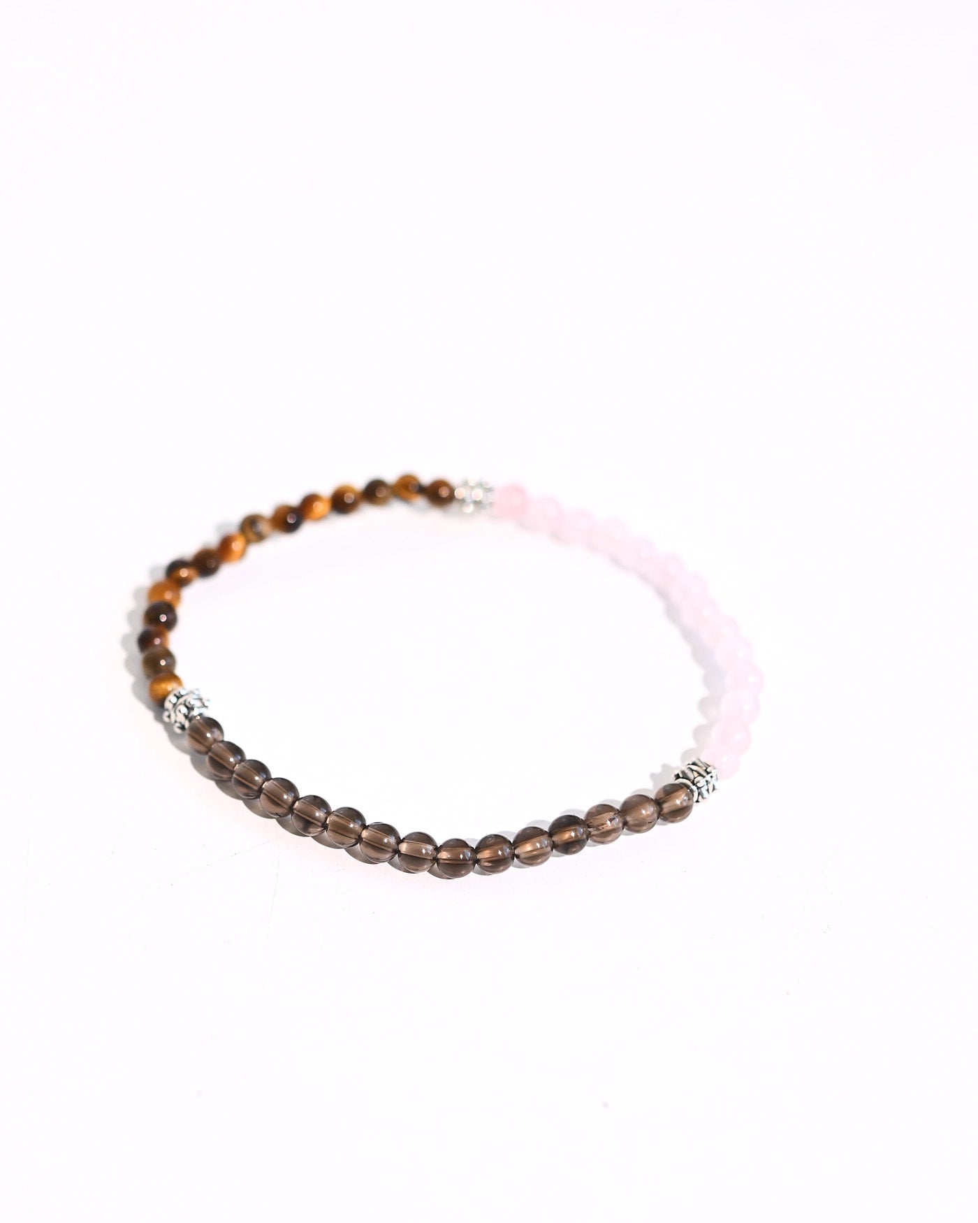 Smoky Quartz and Tiger Eye Bracelet on display