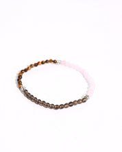 Smoky Quartz and Tiger Eye Bracelet on display