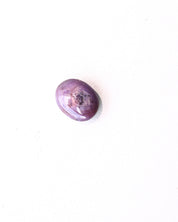 Star sapphire gem B showing translucency