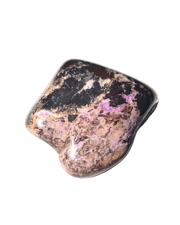 A freeform Sugilite crystal with a mix of dark and light purple hues, and hints of black and pink, displayed on a white background.