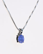 Tanzanite oval pendant detail 925 sterling silver prong setting