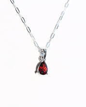 Deep red garnet pendant necklace close-up
