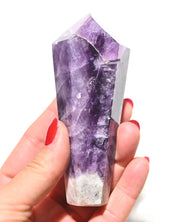 Trapiche Amethyst Point - polished crystal point close up detail
