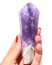 Trapiche Amethyst Point - hand-held view showing deep purple saturation and white quartz base