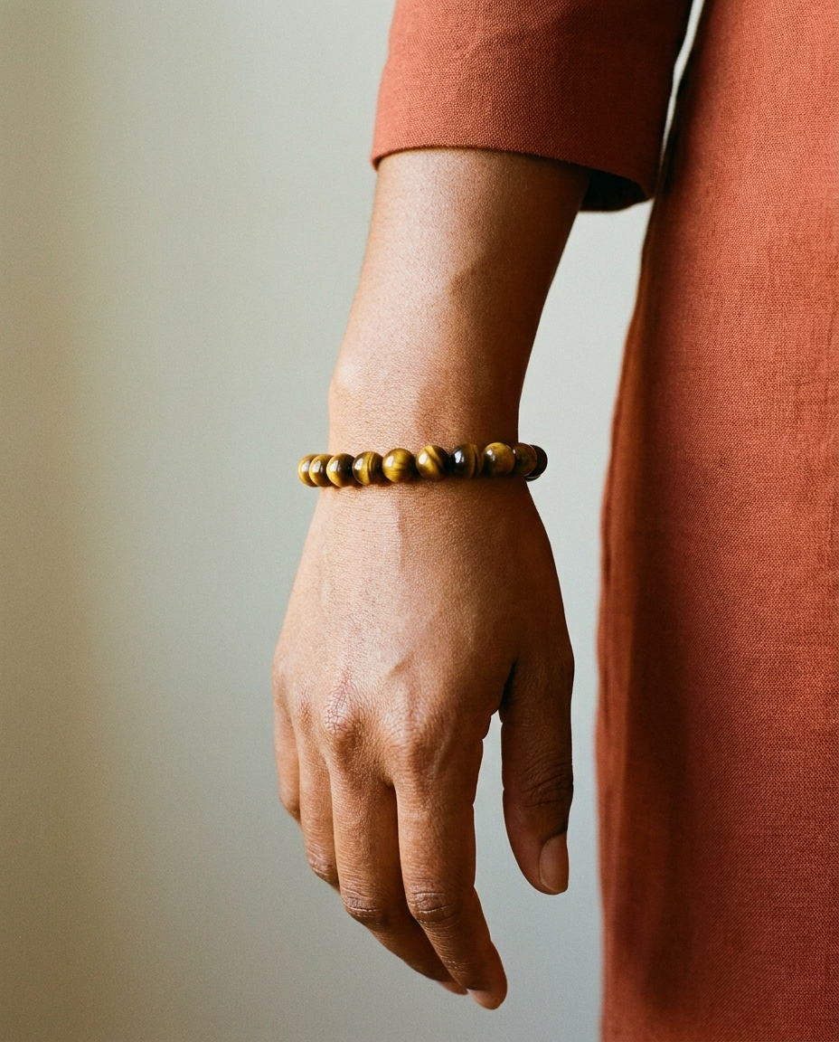 Tiger's Eye Bracelet wrist shot - model wearing golden amber tiger's eye beads