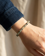 Prehnite Bracelet wrist shot - model wearing pale sage green prehnite beads