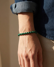 Malachite Bracelet wrist shot - model wearing forest green malachite beads