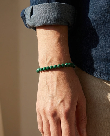 Malachite Bracelet wrist shot - model wearing forest green malachite beads