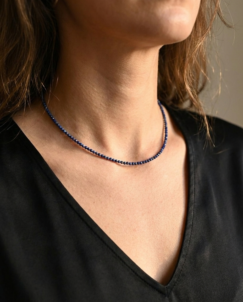 Model wearing lapis lazuli beaded necklace
