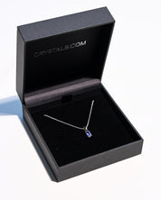 Emerald-cut tanzanite necklace on sterling silver box chain